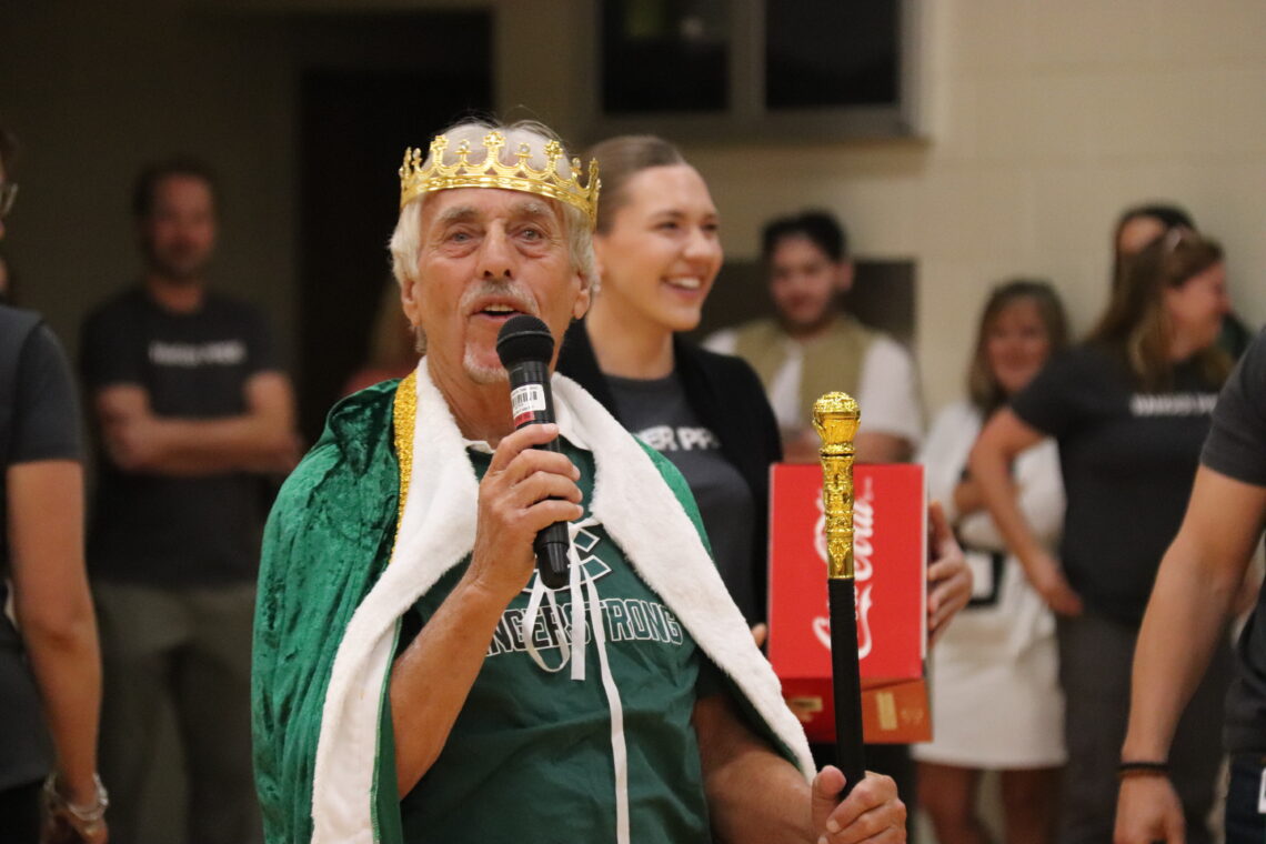 Larry DeBoer in a crown and cape on the first day of the 2024 - 2025 school year.