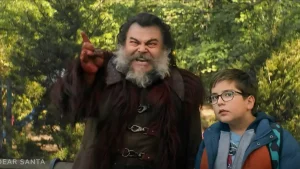 An image from the film showing "Santa" and our main character, Liam